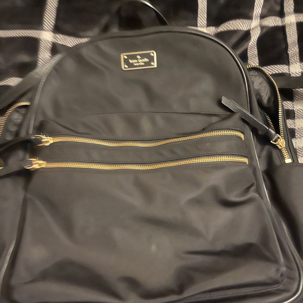 Kate spade nylon backpack Guc straps are stripped on some parts
